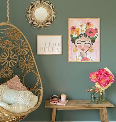 Colorful Frida gallery wall Frida prints oak frames
